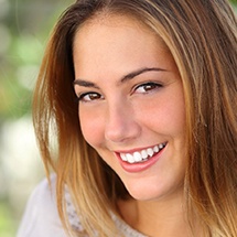 woman smiling outside