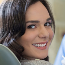 Smiling woman in dental chair