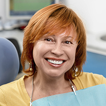 Woman with red hair smiling