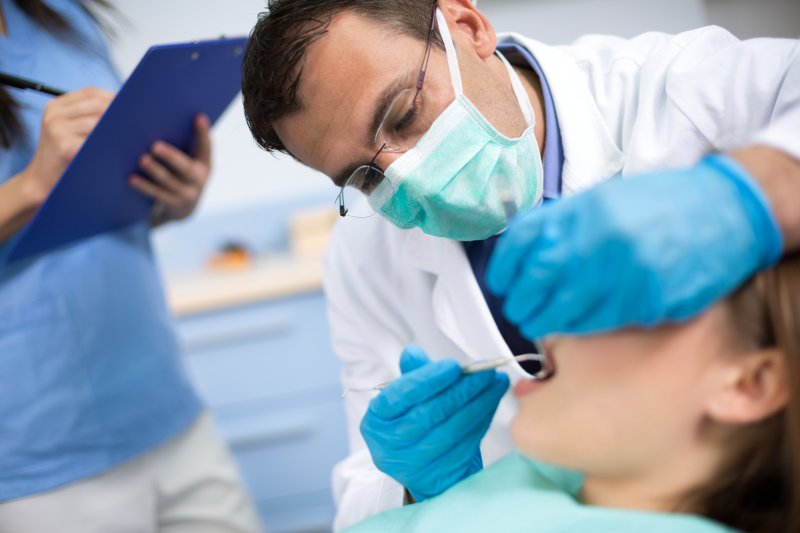A dentist in Joplin performing an exam.